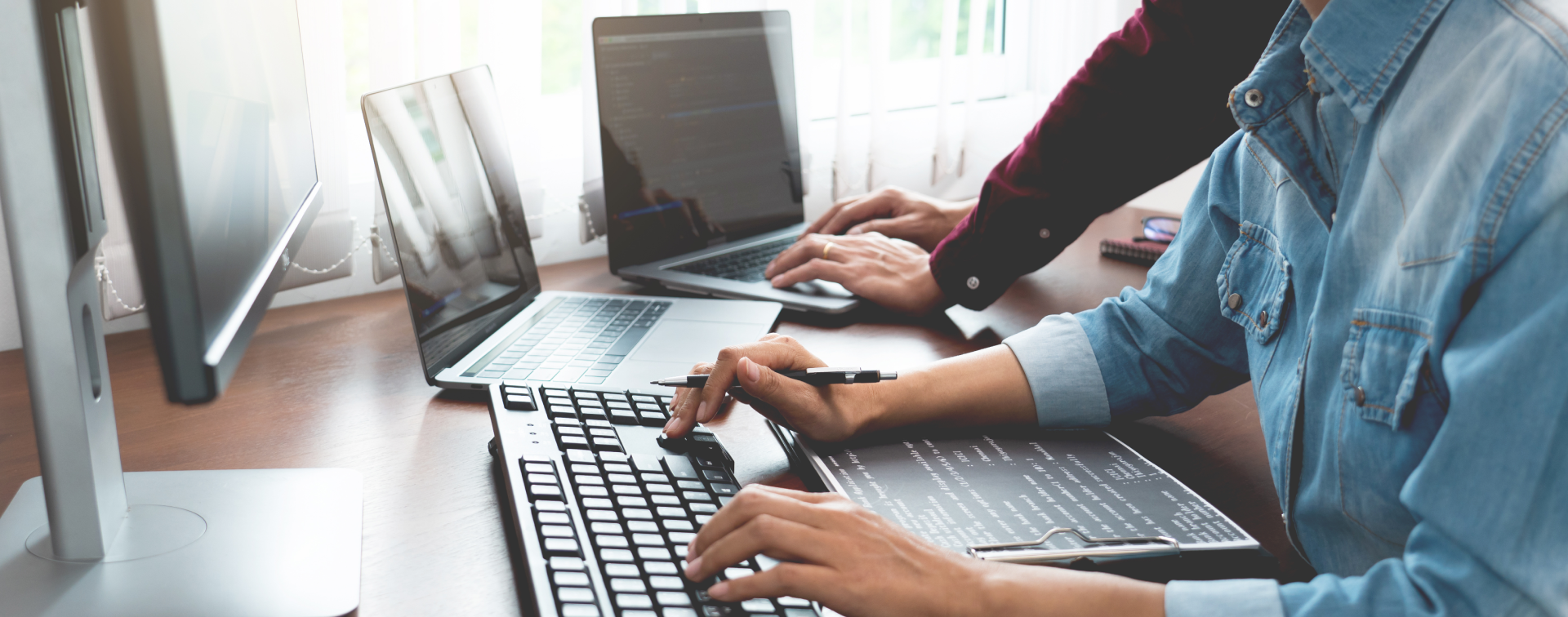 People at computers providing support